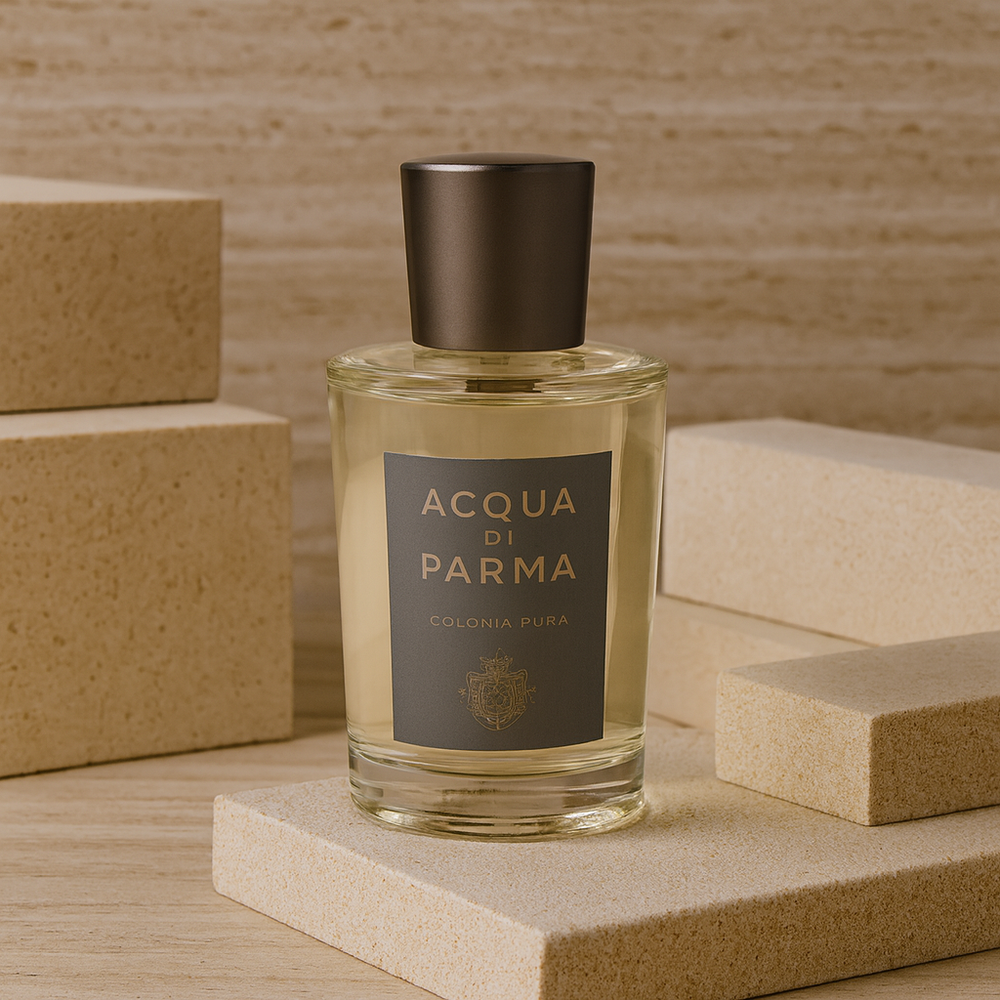 Acqua di Parma cologne bottle on a beige platform with wooden blocks in the background