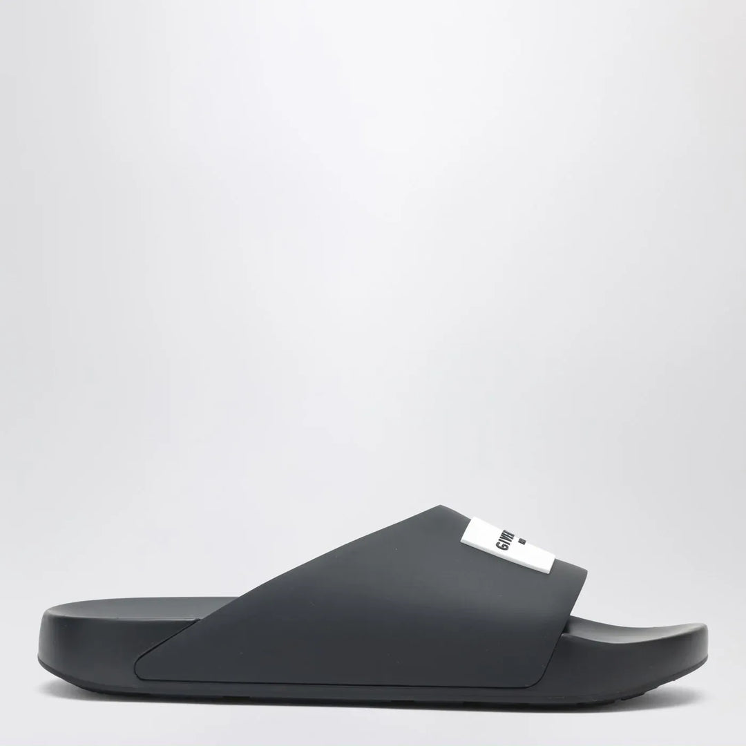 Givenchy - Label flat mules in black rubber Brand Shoes